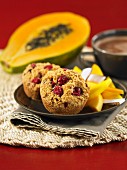 Cranberry and orange muffins with exotic fruit