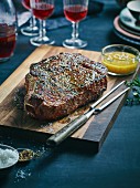 Grilled rib-eye steak with shallot butter