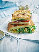 Grilled focaccia with mozzarella and rocket