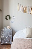 Accessories in delicate shades in bedroom
