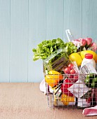 Various foods in a shopping basket