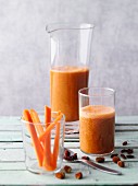 Carrot and physalis smoothie with goji berries and ginger