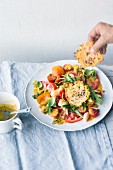 Tomato and apricot salad with Parmesan wafers