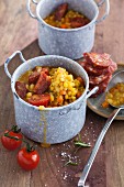 Yellow lentil stew with chorizo and cherry tomatoes