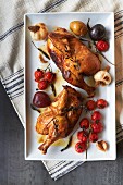 Half a roast chicken with cherry tomatoes