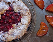 Rustic wild raspberry and persimmon tart (seen from above)