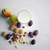 Nuts, pears, damsons and a glass of milk