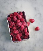 Raspberries in a paper punnet