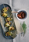 Courgette rolls with dried tomatoes