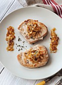 Tuna fish steaks with white wine onions