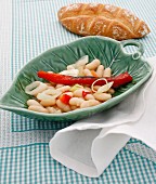 Pickled white beans with grilled peppers