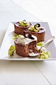 Chocolate and coffee flan with cream and kiwi pieces
