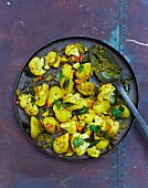 Allo ghobi (cauliflower curry with potatoes, India)