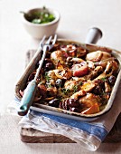 Oven-baked chicken with red onions and olives