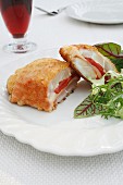 Pork cordon bleu filled with cheese and peppers
