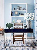 Pattern mix at the desk with a maritime flair; cubic desk with table lamp and floral patterned lampshade