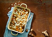 Sweet potato bake with an almond and poppy seed sauce