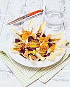 Salad with chicory, oranges, beetroot, smoked macro and walnuts