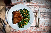 Beef steak with a chickpea and spinach medley