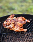 Spicy marinated chicken on a barbecue