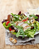 Caesar salad with turkey breast