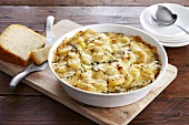 Potato gratin with cheese and fresh herbs