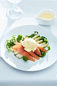 White asparagus with salmon, poached egg and Hollandaise sauce