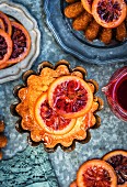 Syrup cakes with candid blood oranges