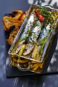 Fish terrine with sardines, fresh herbs, spices and lemon