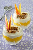 Layered desserts with cream cheese, mango and passion fruit