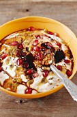 Anise yoghurt with pomegranate seeds and molasses