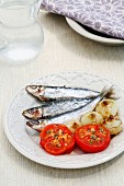 Sardines with tomatoes and onions