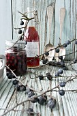 Pickled sloes and sloe syrup with apples