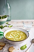 Spinach and pea soup with croutons