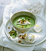 Cream of leek soup with goat's cheese and hazelnuts