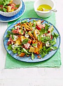 Grilled peach salad with proscuitto and blue cheese