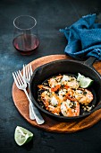 Garlic prawns with lines and a cast-iron pan