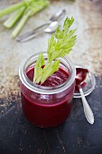 Beetroot smoothies garnished with celery