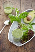 Red lettuce smoothie with avocado and basil