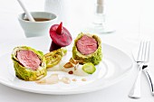 Beef fillet wrapped in Savoy cabbage with beetroot