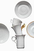 White espresso cups with reliefs and golden details