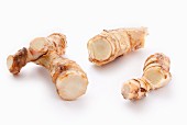 Galangal on a white surface