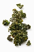 Kale chips on a white surface