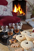 Mince pies and sherry in front of fireplace
