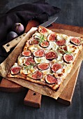 Tarte flambée with figs, goat's cheese and rosemary