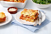 Lasagne bologese with courgettes and flaked almonds