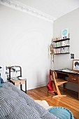 Vintage-style child's bedroom with stucco frieze and wooden floor