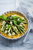 Baseless quiche with green asparagus, goat's cheese and basil