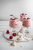 Strawberry yoghurt with fresh raspberries and mini meringues