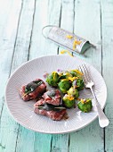 Venison saltimbocca with Brussels sprouts